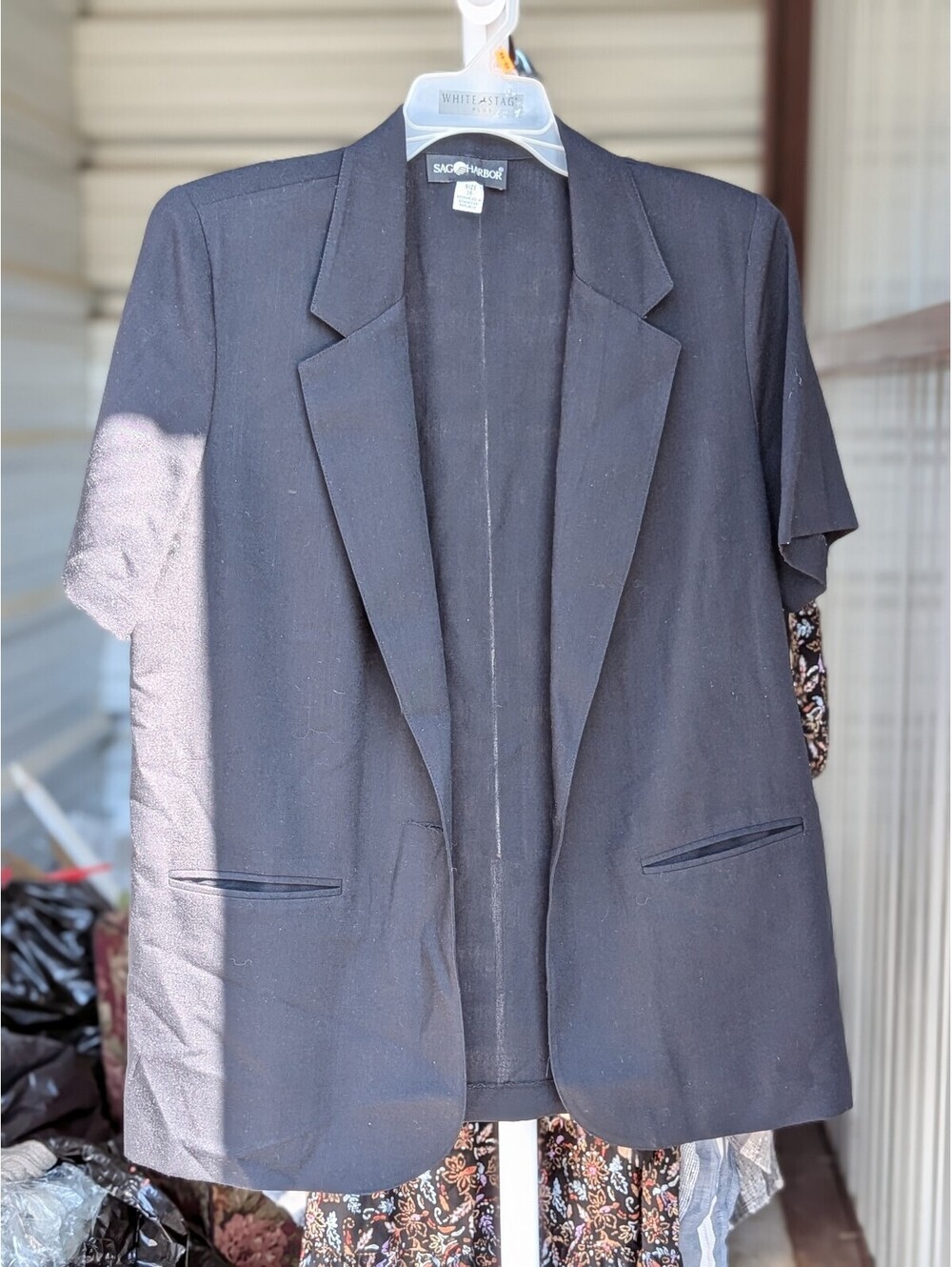 Dark open front short sleeve blazer